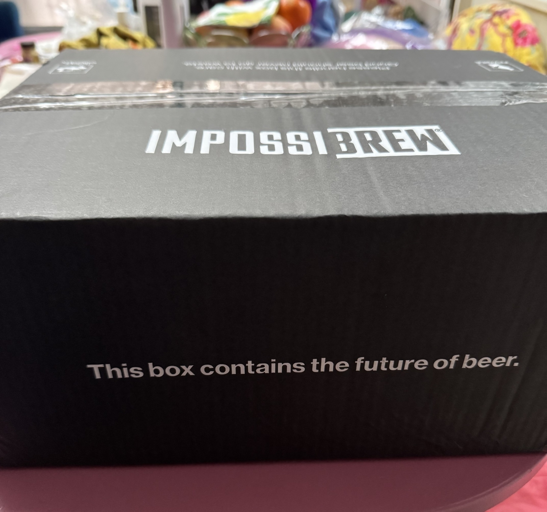 Photo of unboxed starter pack of Impossibrew - subtitle says This box contains the future of beer
