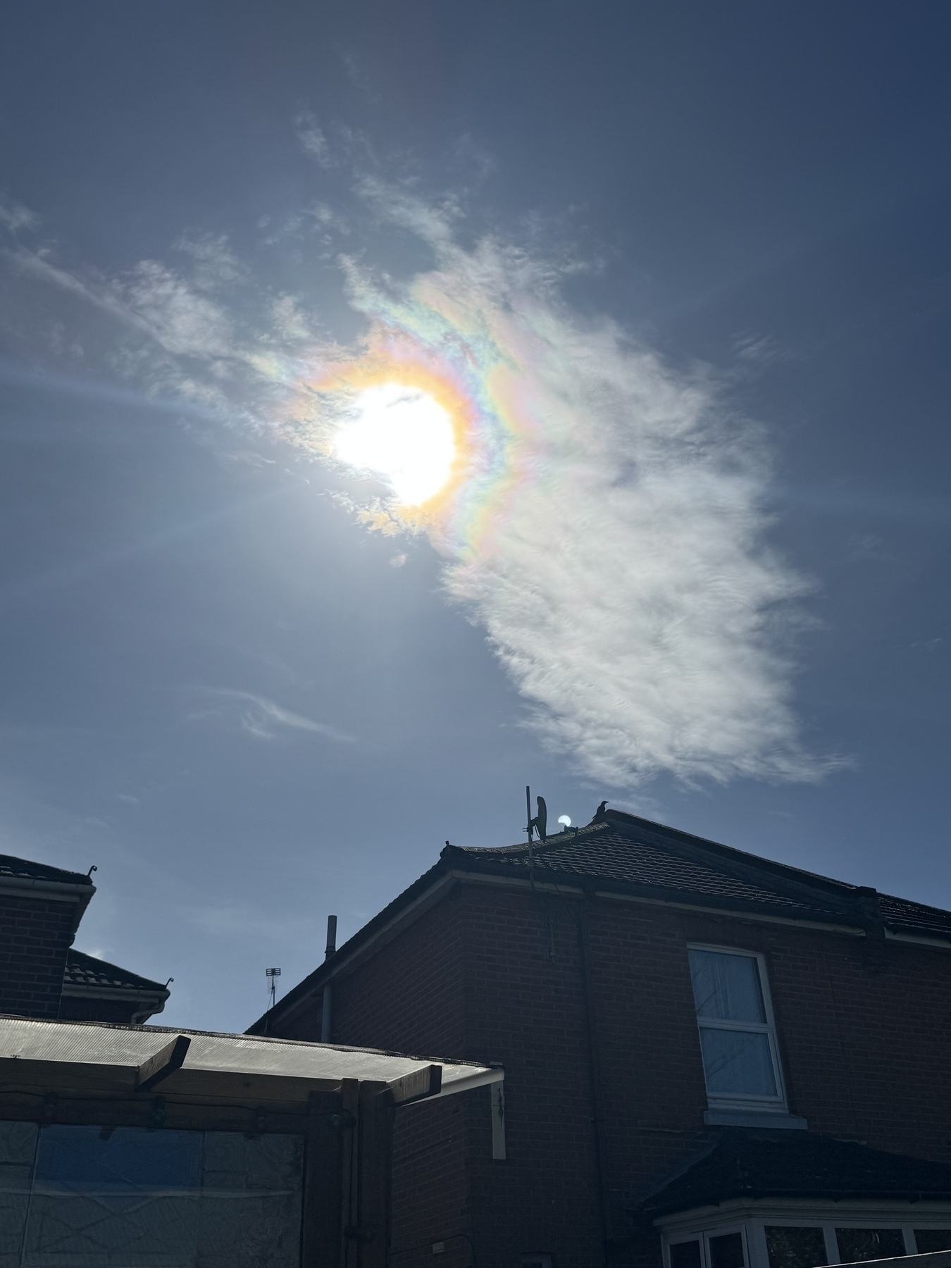 Photo of the partial solar eclipse just as the one few clouds across Southampton was passing in front of the sun 