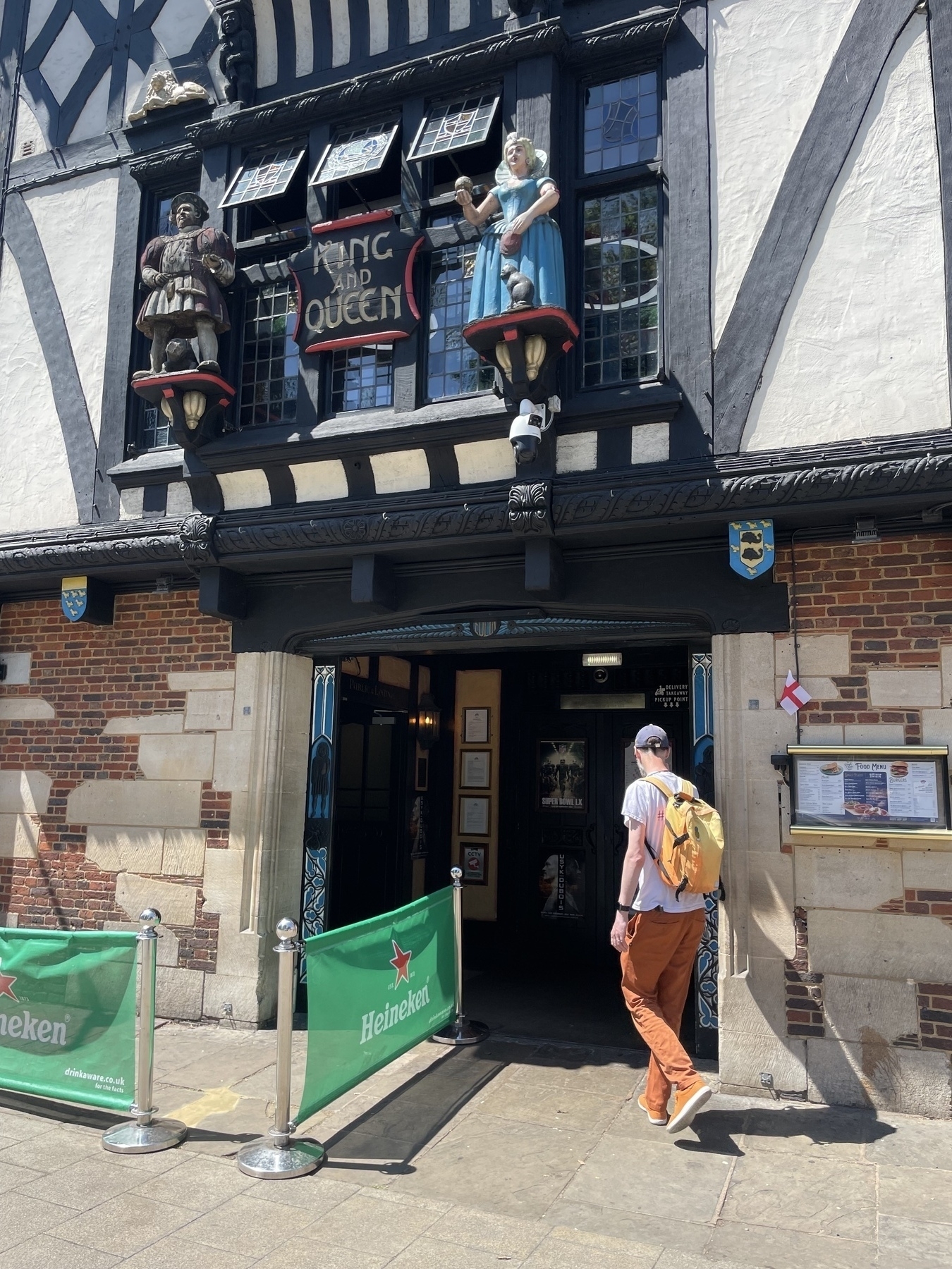 Photo of Adam Procter walking into the King and Queen pub Brighton