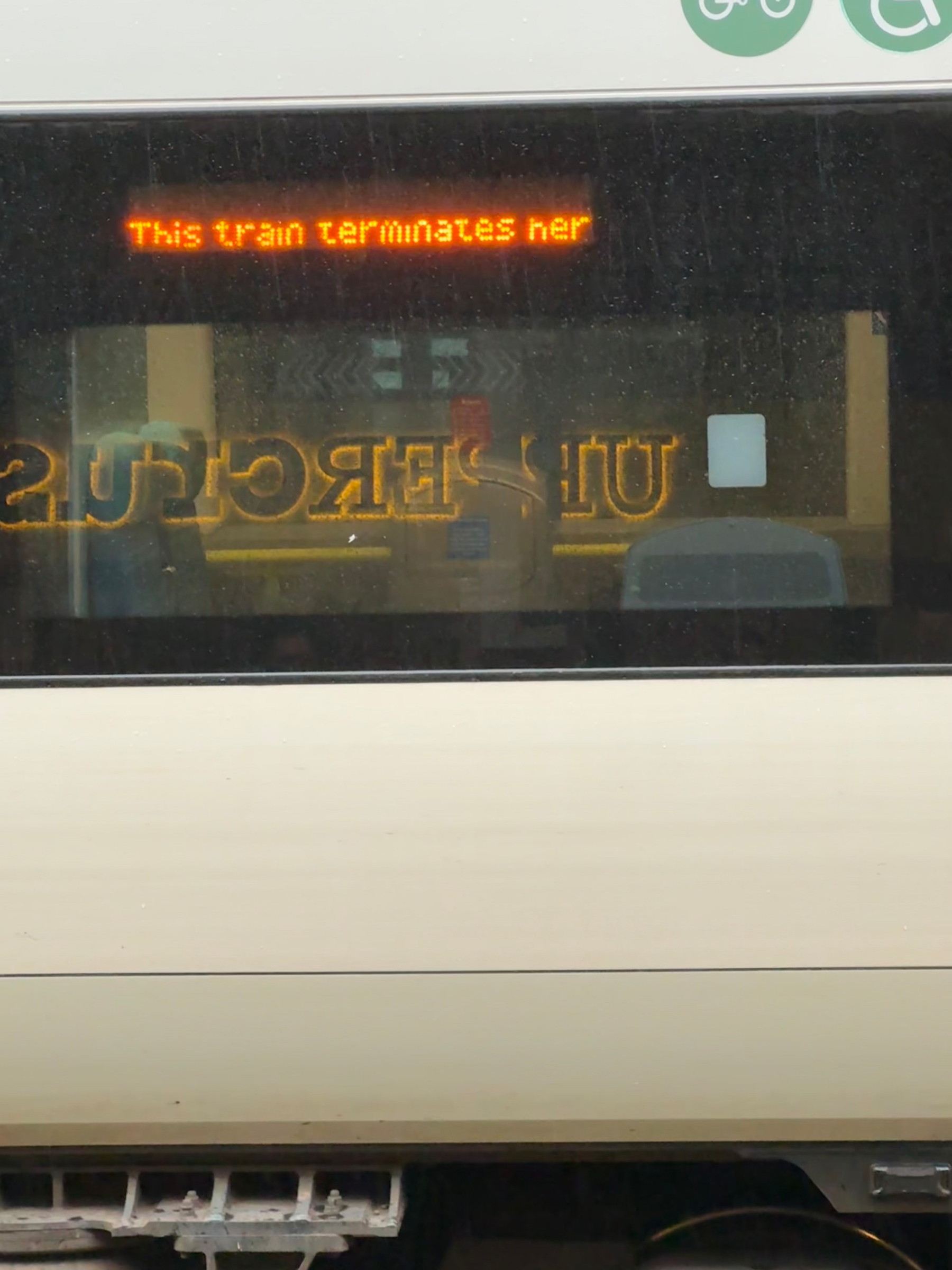 A train display incorrectly spells terminates here as terminates her.